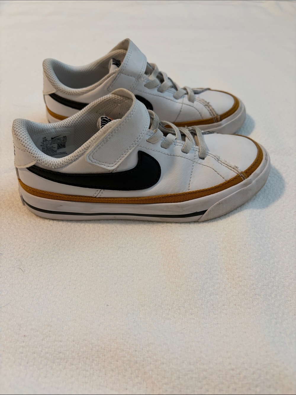 Nike Kids White Sneakers with Tan Trim and Black Swoosh Little Kid Size 12
